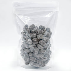 Donty-Tonty Claeys 2 lb bag beside everyday objects shows bulk size and refill convenience