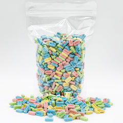 Donty-Tonty hand holding pieces to show scale and grab-and-go convenience
