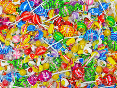 Dooboe close-up of soft taffy texture, highlights colorful variety and chewiness