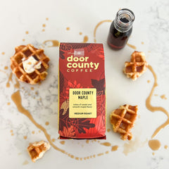 Door County Coffee label detail highlighting maple flavor and 100% Arabica claim