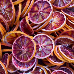 Drink Botanicals Ireland blood orange wheel used as cocktail garnish benefit: instant visual upgrade