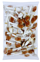 dulces típicos close-up of tamarind spoon texture highlighting spicy sweet paste and bold flavor