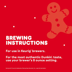 Freshly brewed cup of Dunkin' gingerbread coffee with steam showing warm aroma and festive taste