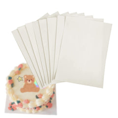 DVECUE front view of wafer paper pack showing clean white sheets and branding, reliable printing