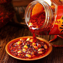 EAPC ingredients display with roasted chili, peanuts and rapeseed oil showing natural components and quality