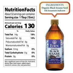 Eden Organic black sesame oil pouring close-up highlighting rich texture