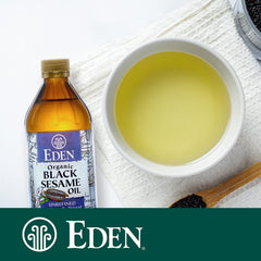 Eden Organic black sesame oil sizzling in skillet to boost savory dishes