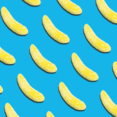 efrutti banana gummies in a bowl at a party adding colorful dessert appeal