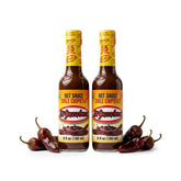 El Yucateco front packaging showing twin chipotle bottles and smoky flavor benefit
