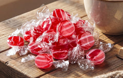 emporium candy red-and-white discs in glass jar for visual display and event styling benefit