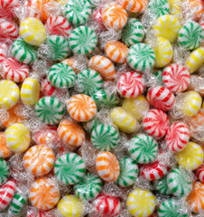 EMPORIUM CANDY TASTY TREATS front packaging showing colorful fruit swirls and bag size benefit