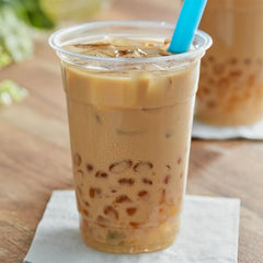 Fanale spoonful of crystal boba over frozen yogurt showing topping convenience
