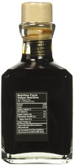 Fattoria Estense bottle beside salad demonstrating finishing flavor benefit