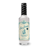Fee Brothers bottle front view showing label and volume, clear product identification and benefit