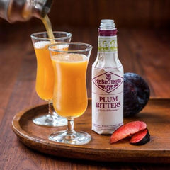 Fee Brothers plum bitters used in a cocktail glass as garnish adds balanced plum aroma and depth