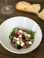 FERMIN lomo arranged on charcuterie board for elegant serving and pairing