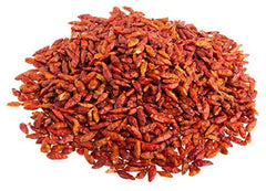 Fiery Farms close-up of red bird's eye pod texture showing preserved flavor