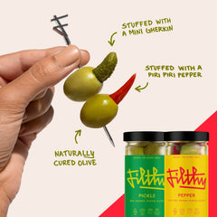 Filthy stainless-steel picks holding olives, durable reusable garnish solution