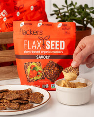 Arrangement of core ingredients with Flackers brand showing flaxseed and spices freshness benefit