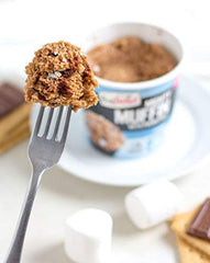 Close-up of muffin interior texture highlighting moist cake and protein content