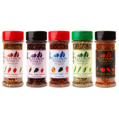 Flatiron Spice bottle beside a measuring spoon showing size and portion control