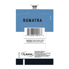 Close-up of Flavia Freshpack contents showing dark-roasted grounds and rich texture for aroma