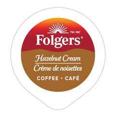 Top view of a Folgers Hazelnut Cream K-Cup pod ready to brew, easy single-serve use