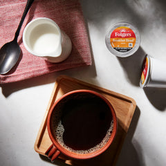 Folgers K-Cup pod in Keurig brewer ready to brew a consistent cup
