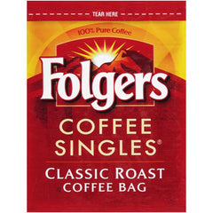 Folgers packets beside a cup and ruler showing packet size and easy storage