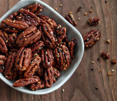 Fortune Favors pecans sprinkled on salad, adds crunch and savory balance
