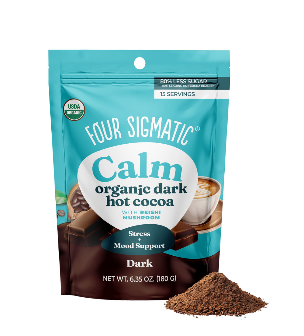 Four Sigmatic calm mushroom cocoa mix tin front showing label and organic branding benefits