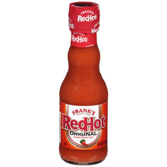 Frank's RedHot front packaging showing brand and 5 fl oz bottle, adds bold flavor