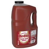 Frank's RedHot gallon front view showing jug and label benefit: bulk convenience