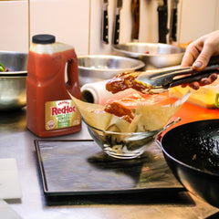 Frank's RedHot sauce drizzle highlighting texture and glaze-ready sheen