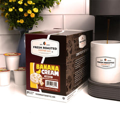 Fresh Roasted Coffee pouring into a mug illustrating creamy banana vanilla flavor enjoyment