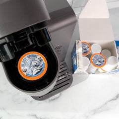 Fresh Roasted Coffee close-up of a Black Knight K-Cup pod highlighting capsule detail and convenience