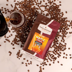 Fresh Roasted Coffee poured cup in lifestyle setting highlighting smooth maple flavor benefit