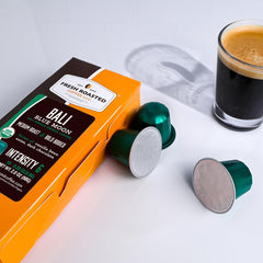 Fresh Roasted Coffee espresso shot with crema illustrating concentrated taste and brewing quality