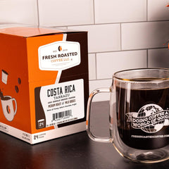 Fresh Roasted Coffee close-up of K-Cup pod top highlighting convenient single-serve brewing