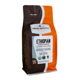 Fresh Roasted Coffee front packaging showing 12 oz bag and organic seals for quality