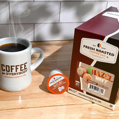 Top-seal view of Fresh Roasted Coffee pod showing nitrogen-flush freshness and seal