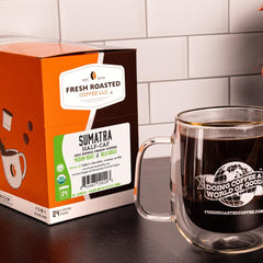 Fresh Roasted Coffee green Sumatra beans on burlap highlighting single-origin quality
