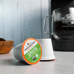 Fresh Roasted Coffee pod close-up displaying filter and coffee freshness benefit