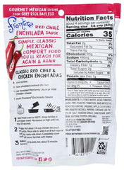 Frontera sauce poured over assembled enchiladas in oven for effortless meal finishing