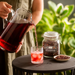 Frontier Co-op dried hibiscus on spoon to show scale and usable portion sizes