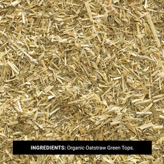 Cup of brewed oatstraw tea beside loose herb showing Frontier Co-op freshness and soothing flavor