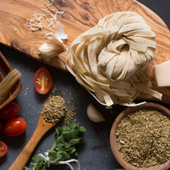 Frontier Co-op oregano on spoon for measuring consistent seasoning benefit