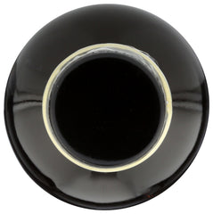 Frontier Co-op vanilla pouring into a glass to show smooth flavor integration