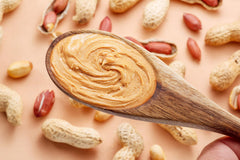 Fruidles peanuts simmering in a pot demonstrating cooking versatility and flavor