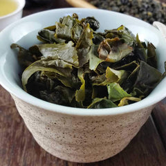 FullChea teaspoon portion next to scale to illustrate serving size and quantity